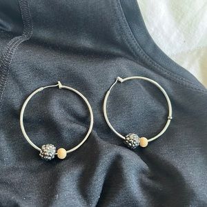Large silver hoops with black sparkle bead embellishment